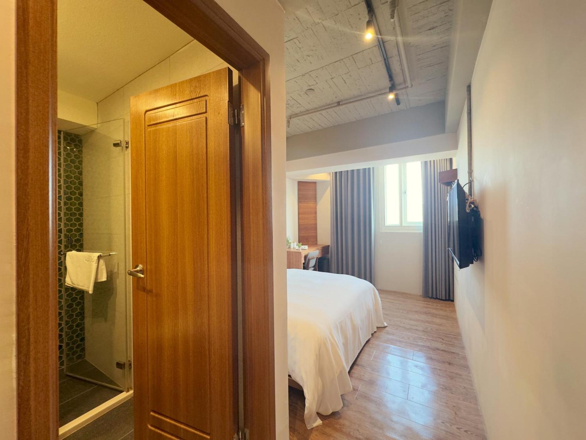 Roaders Hotel Tainan Chengda Rum bild