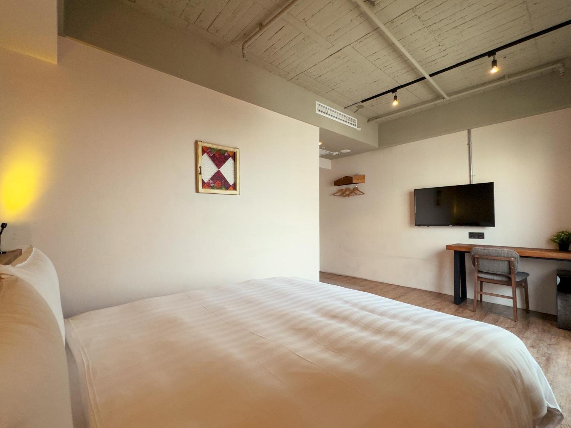 Roaders Hotel Tainan Chengda Rum bild