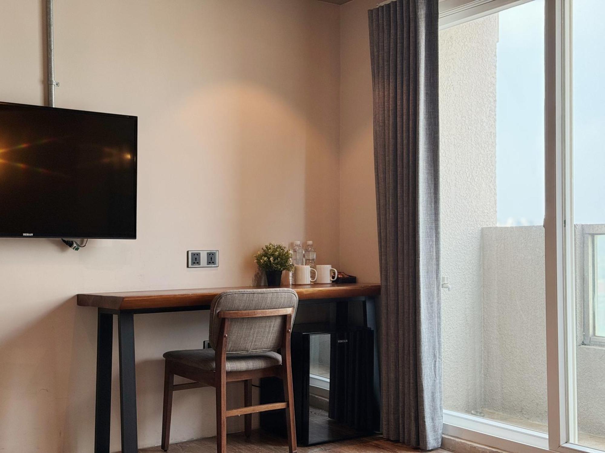 Roaders Hotel Tainan Chengda Rum bild