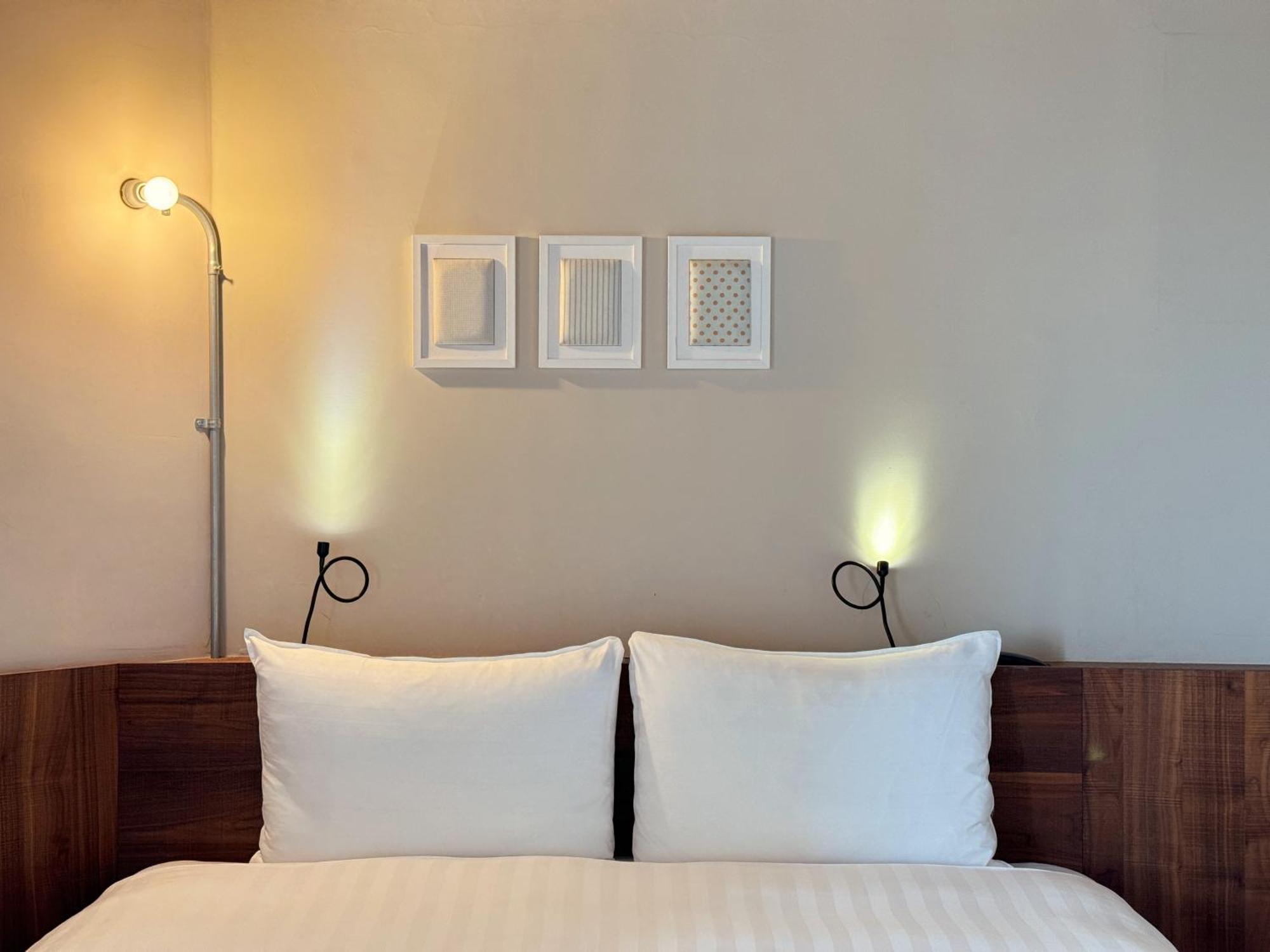 Roaders Hotel Tainan Chengda Rum bild
