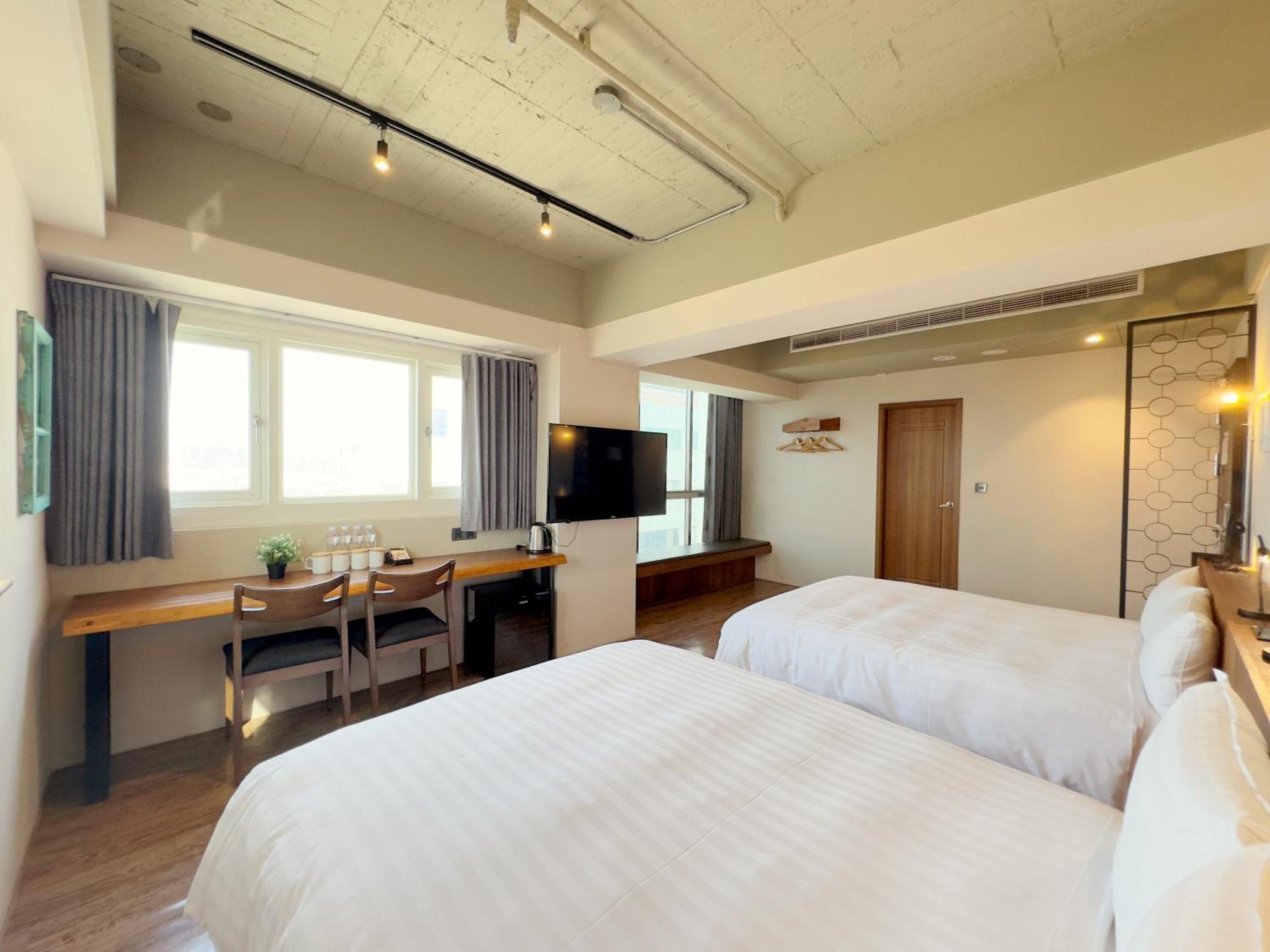 Roaders Hotel Tainan Chengda Rum bild