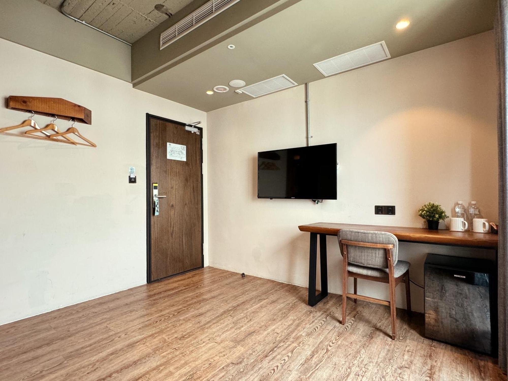 Roaders Hotel Tainan Chengda Rum bild