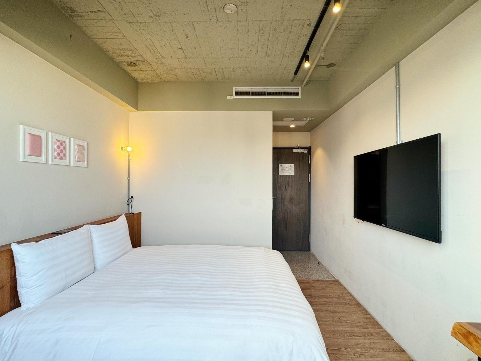 Roaders Hotel Tainan Chengda Rum bild