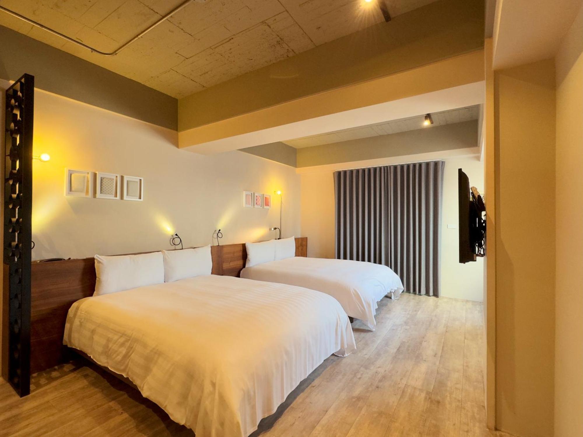 Roaders Hotel Tainan Chengda Rum bild