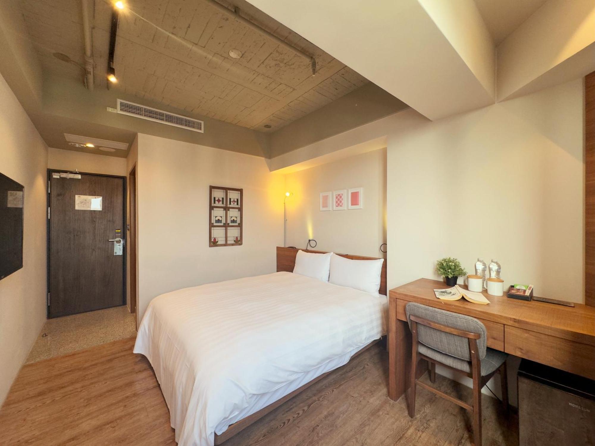 Roaders Hotel Tainan Chengda Rum bild