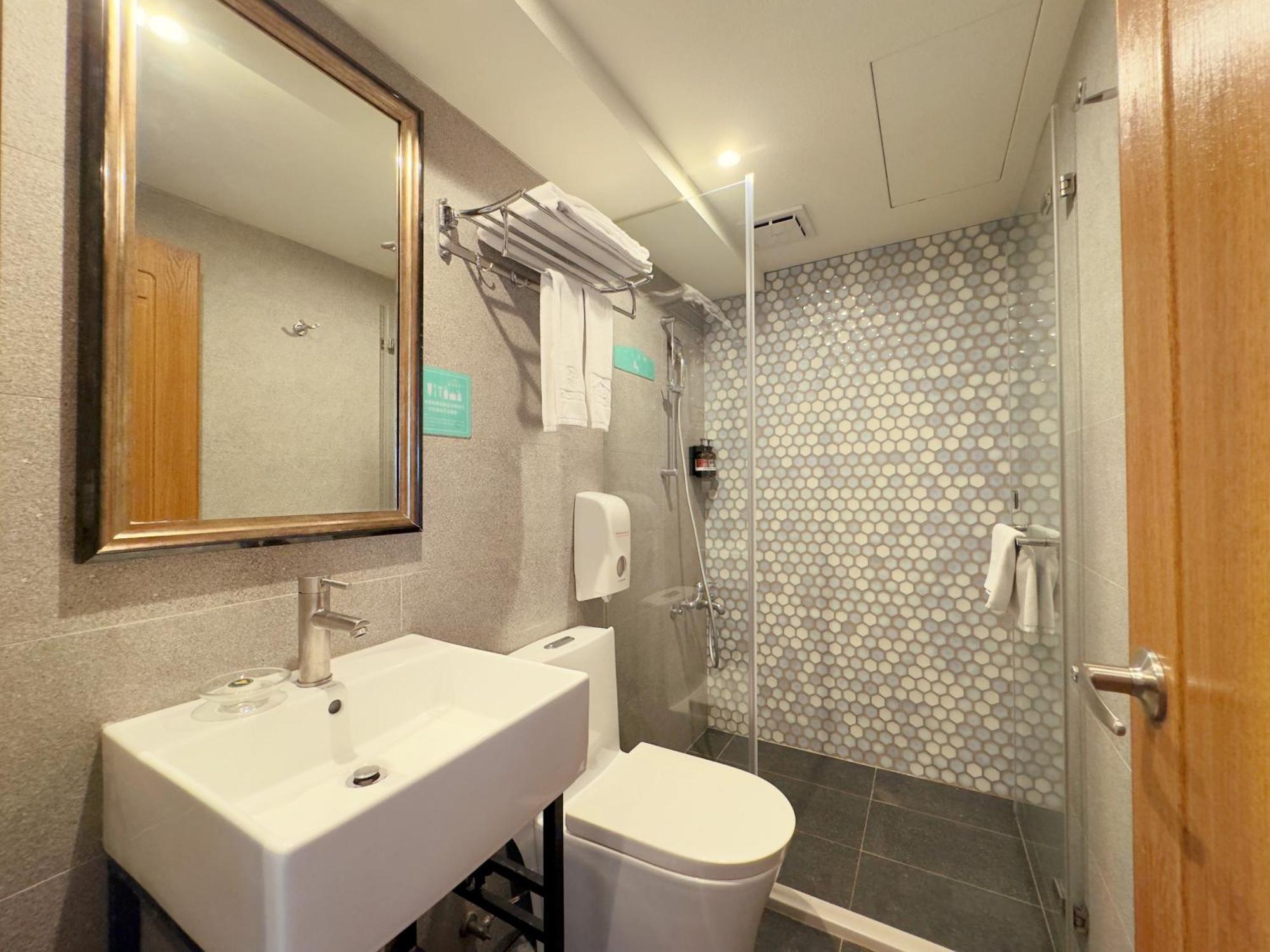 Roaders Hotel Tainan Chengda Rum bild