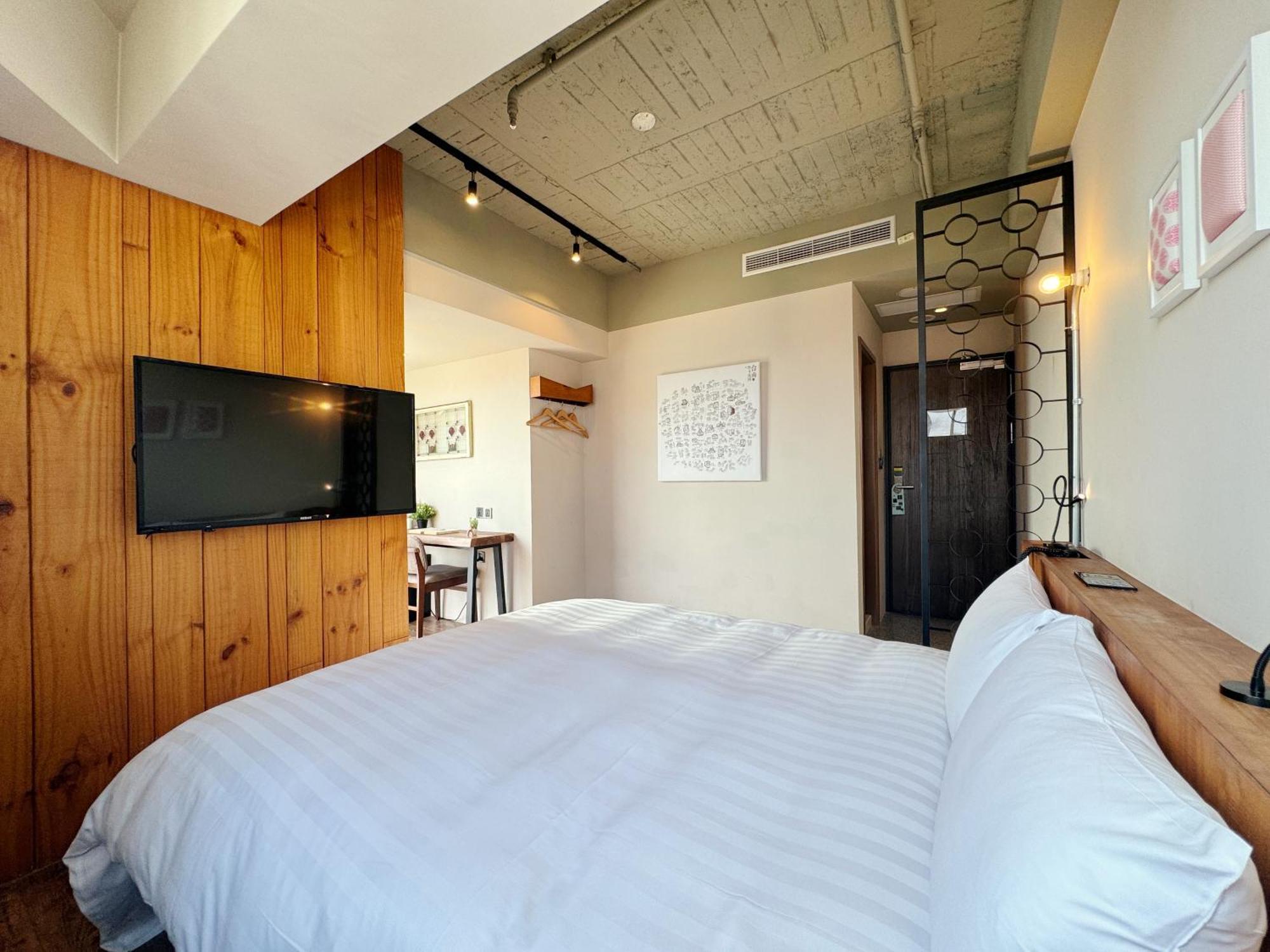 Roaders Hotel Tainan Chengda Rum bild