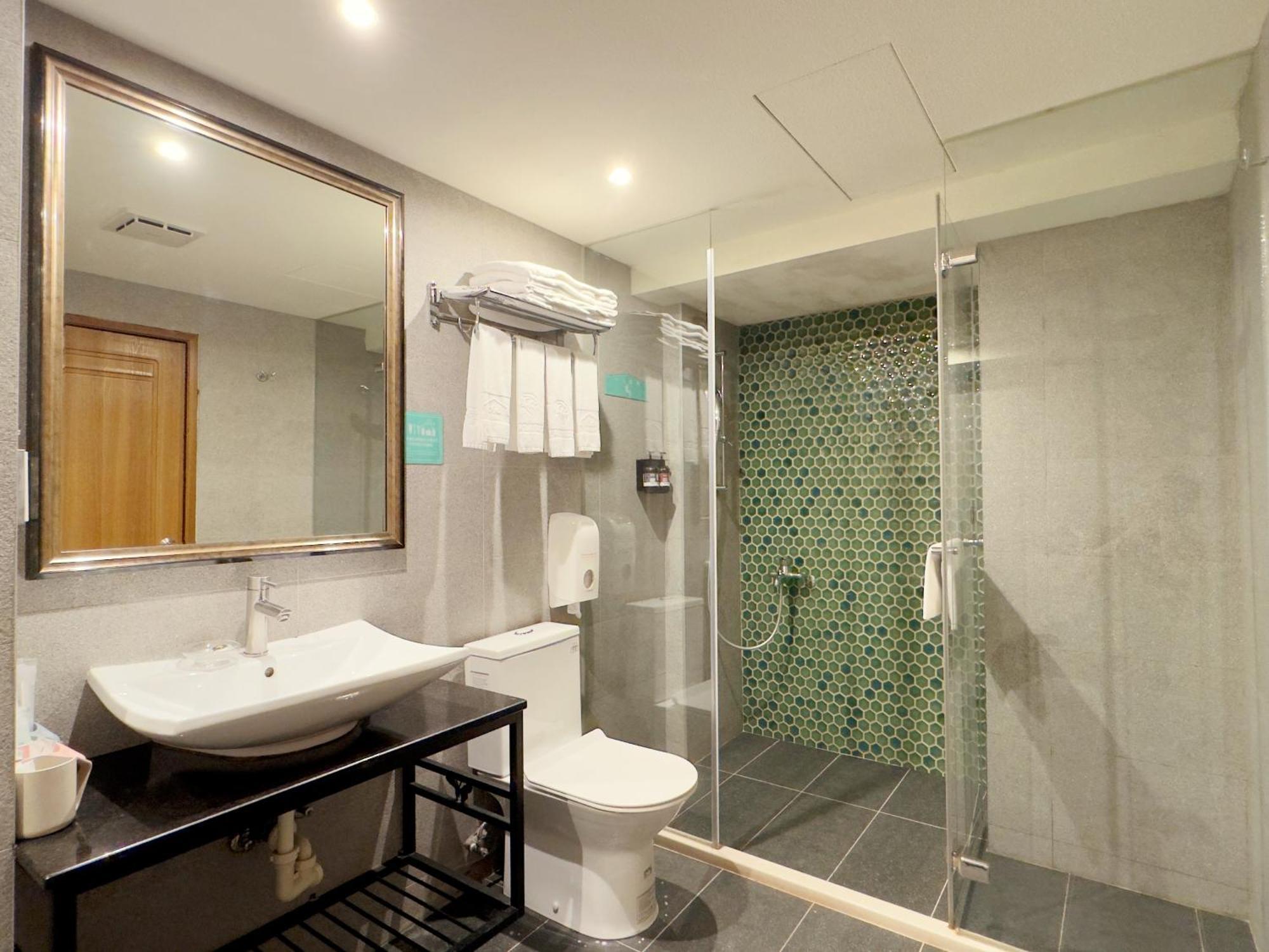 Roaders Hotel Tainan Chengda Rum bild
